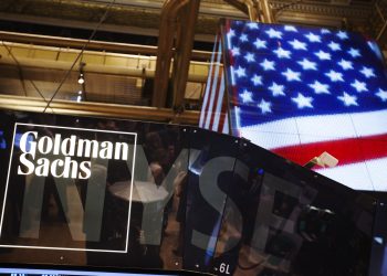 The Goldman Sachs logo is displayed on a post above the floor of the New York Stock Exchange, September 11, 2013.