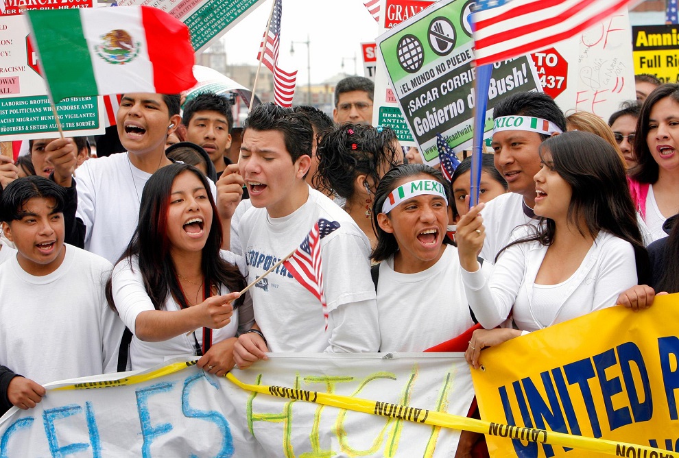 student demonstrators march through the streets of downtown los angeles