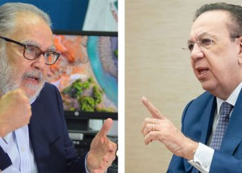 Miguel Ceara Hatton y Héctor Valdez Albizu, ministro de Economía, Planificación y Desarrollo y gobernador del Banco Central, respectivamente.
